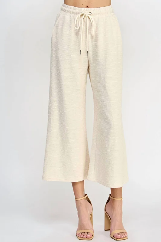 Green plush Pants-Metalic Textured Cropped Wide Pants In Cream